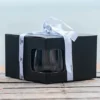 Box of a 4 pack of wine glasses with The Winey Cow logo.